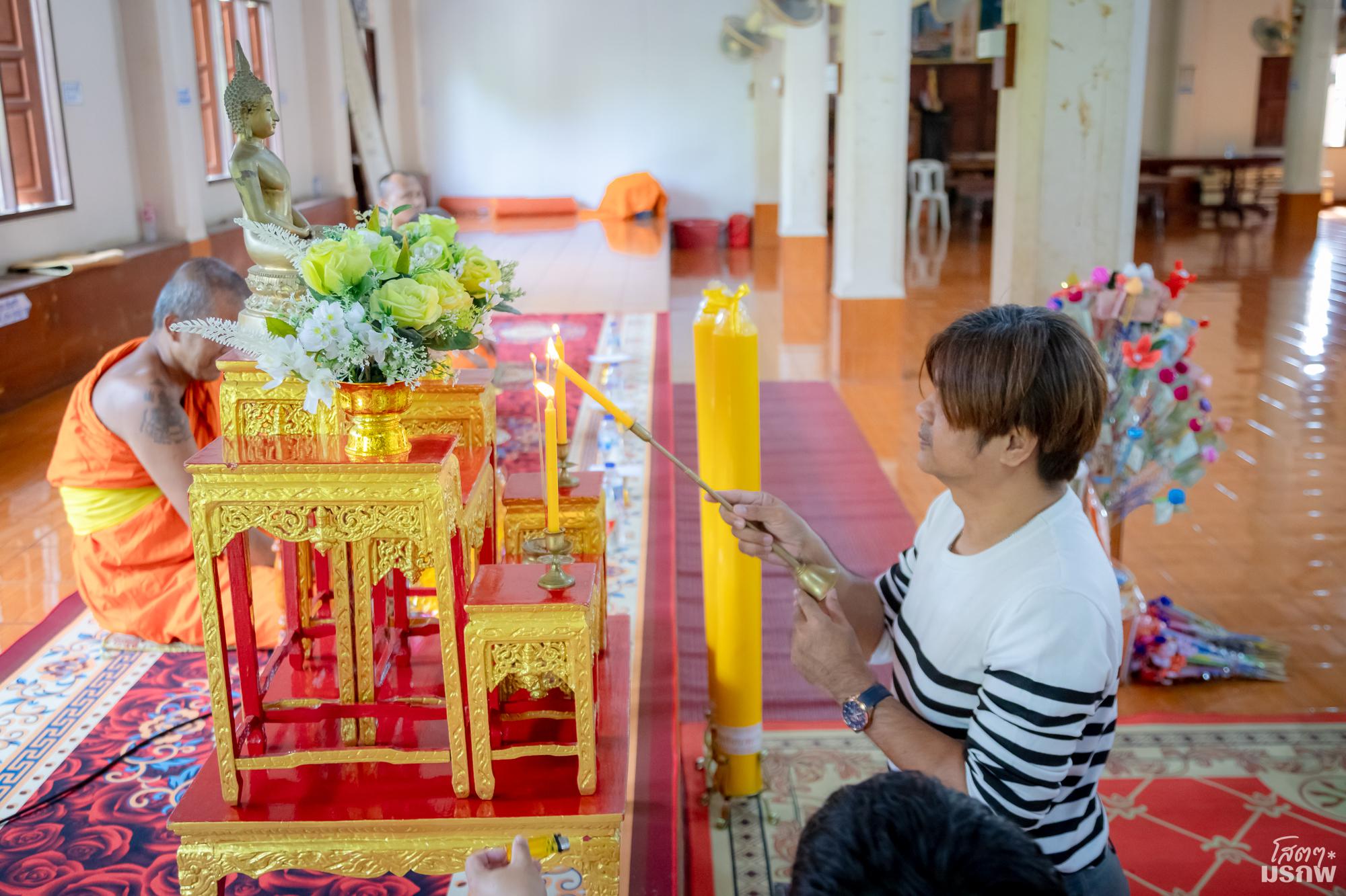 27. กิจกรรมถวายเทียนพรรษา ผ้าอาบน้ำน้ำฝน พร้อมถวายผ้าป่า เนื่องในวันอาสาฬหบูชา และเข้าพรรษา